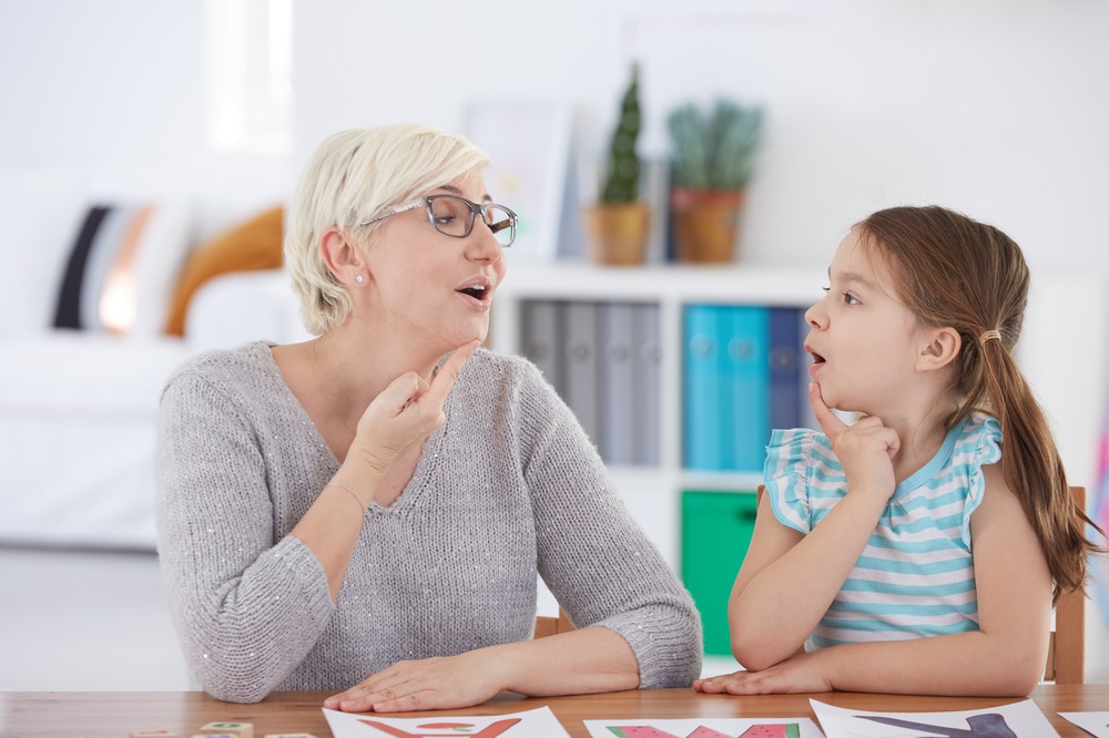 Child at speech pathologist to help with stutter